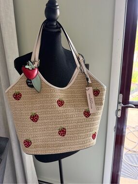 BCBGeneration Straw Tote Bag in Beige with Red Strawberry Accents